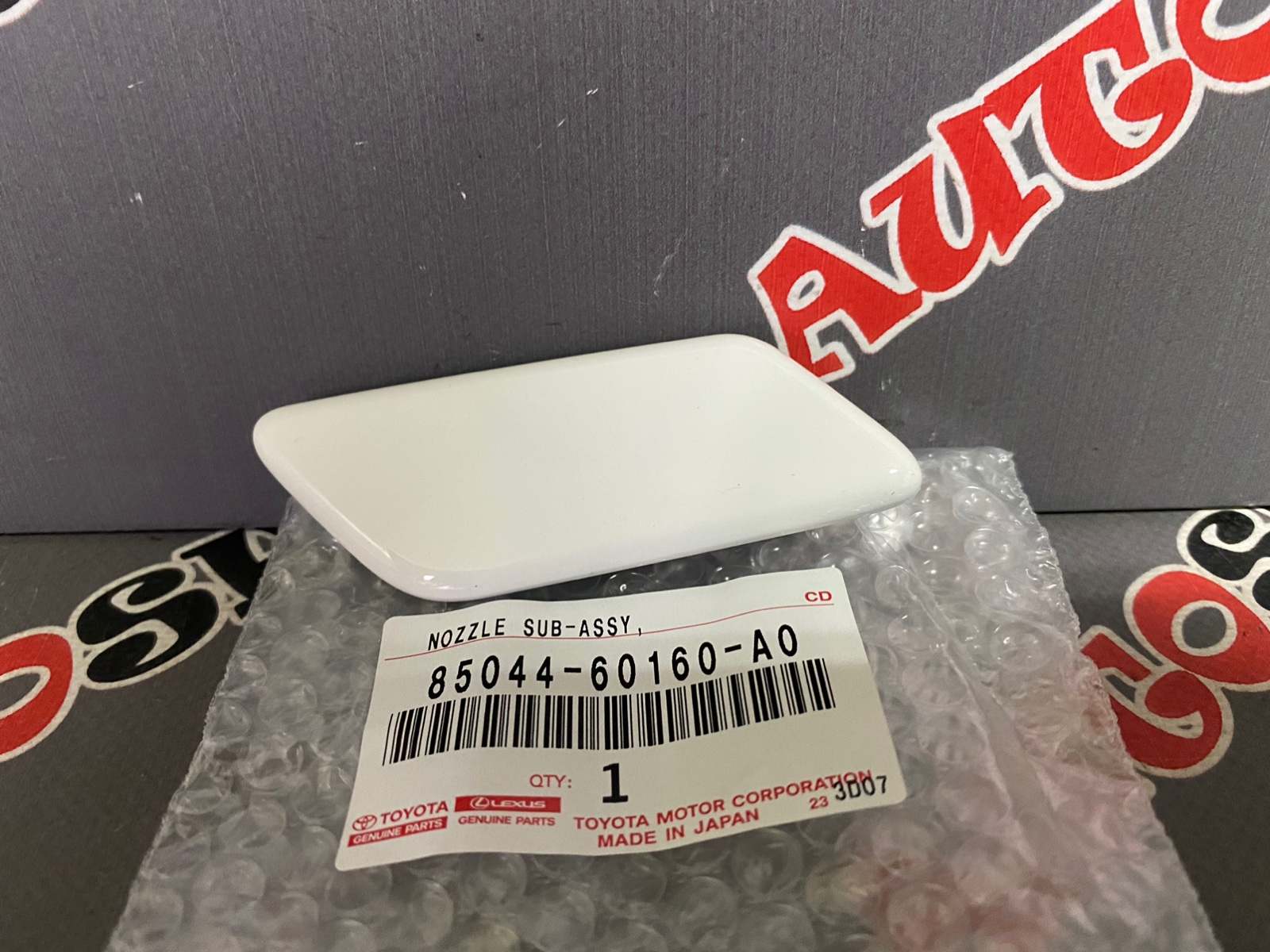 Крышка форсунки омывателя фар правая TOYOTA 85044-60160-A0 / 8504460160A0