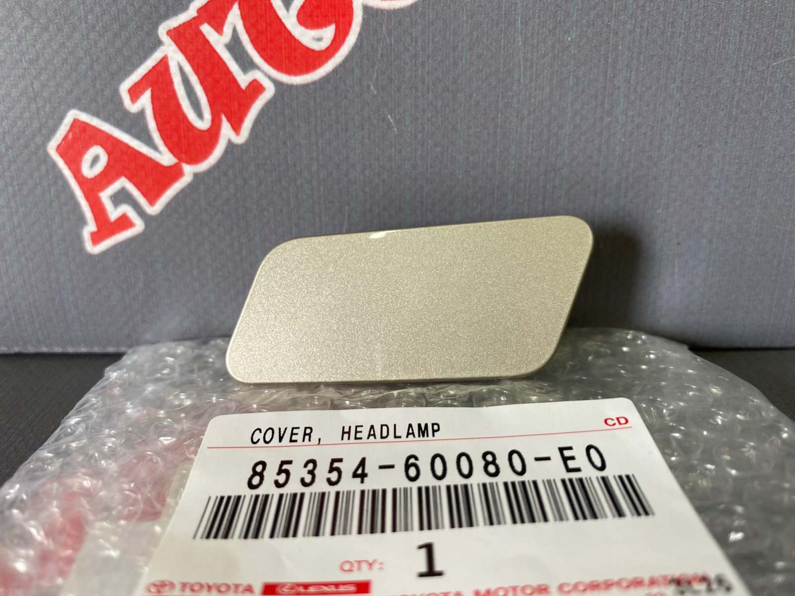 Крышка форсунки омывателя фар левая TOYOTA 85354-60080-E0 / 8535460080E0