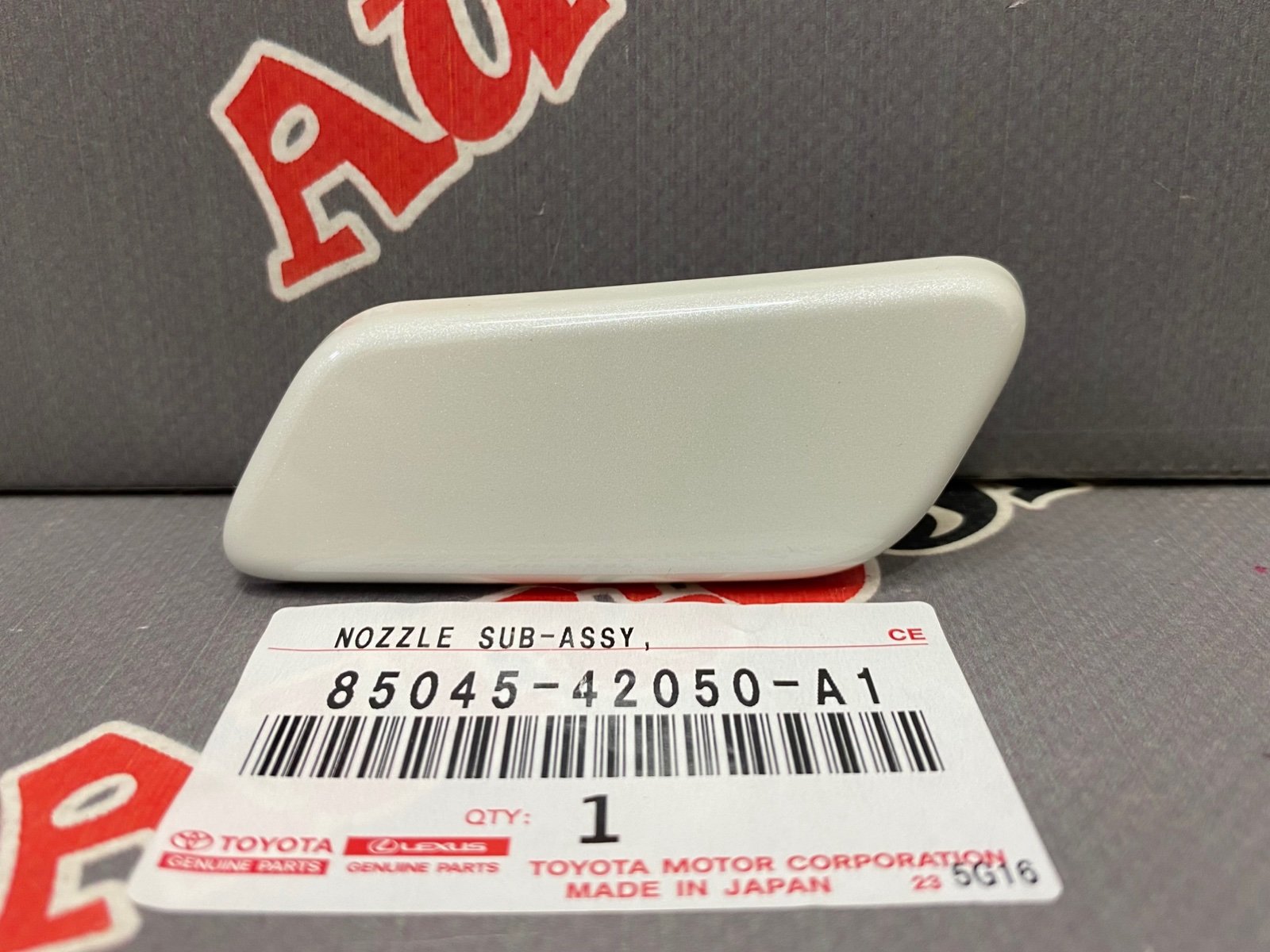 Крышка форсунки омывателя фар левая TOYOTA 85045-42050-A1 / 8504542050A1