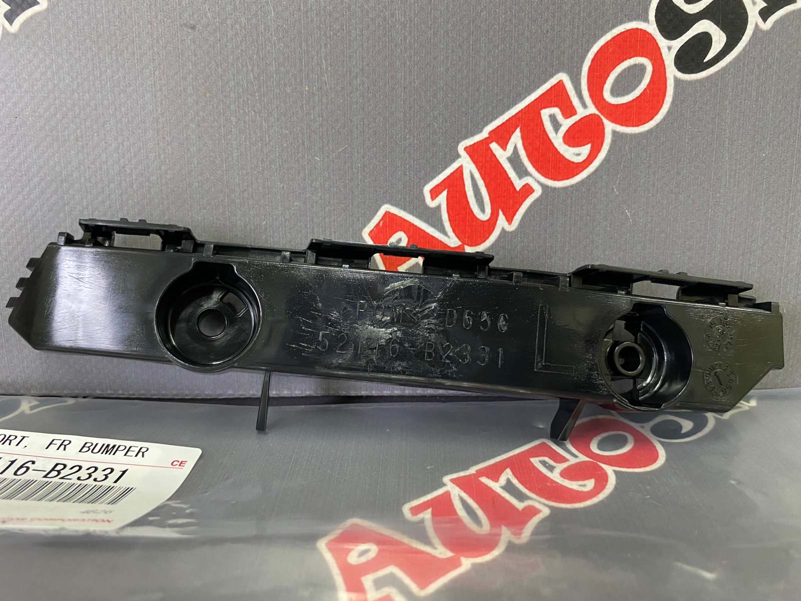 Крепление переднего бампера левое DAIHATSU 52116-B2331 / 52116B2331