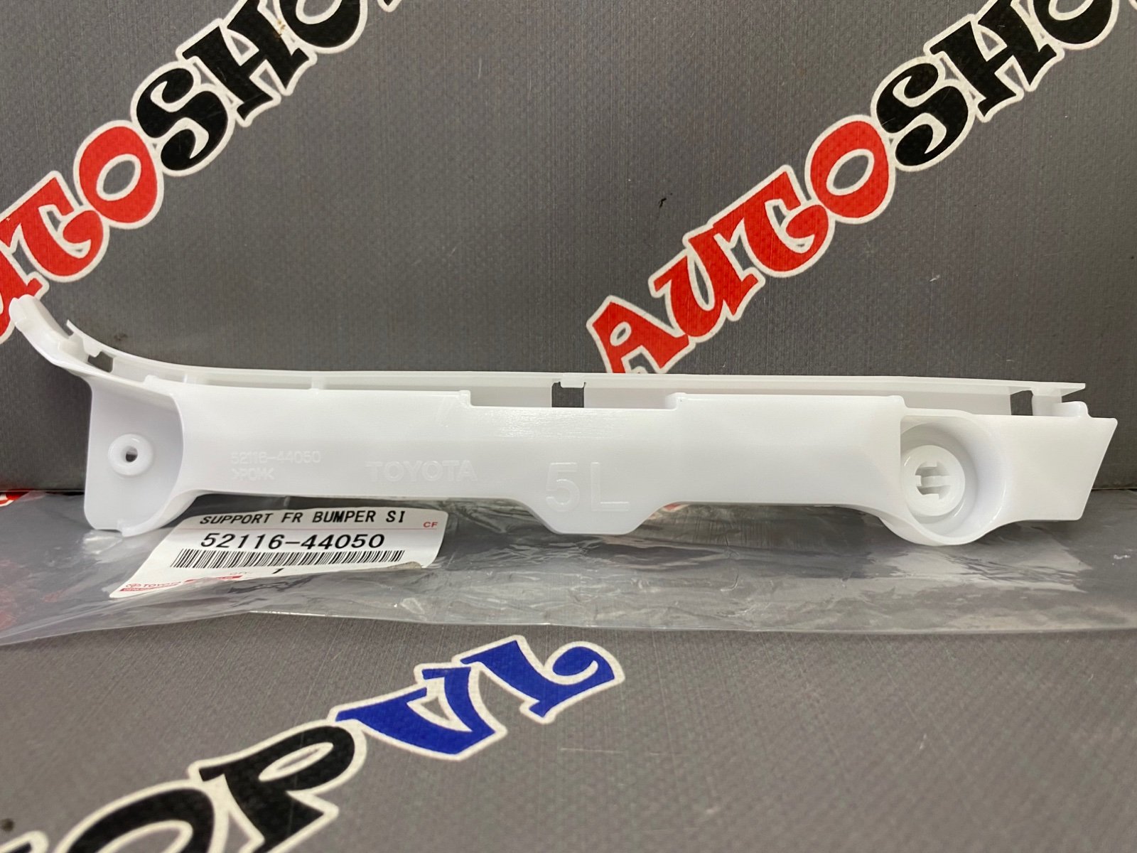 Крепление переднего бампера левое TOYOTA 52116-44050 / 5211644050